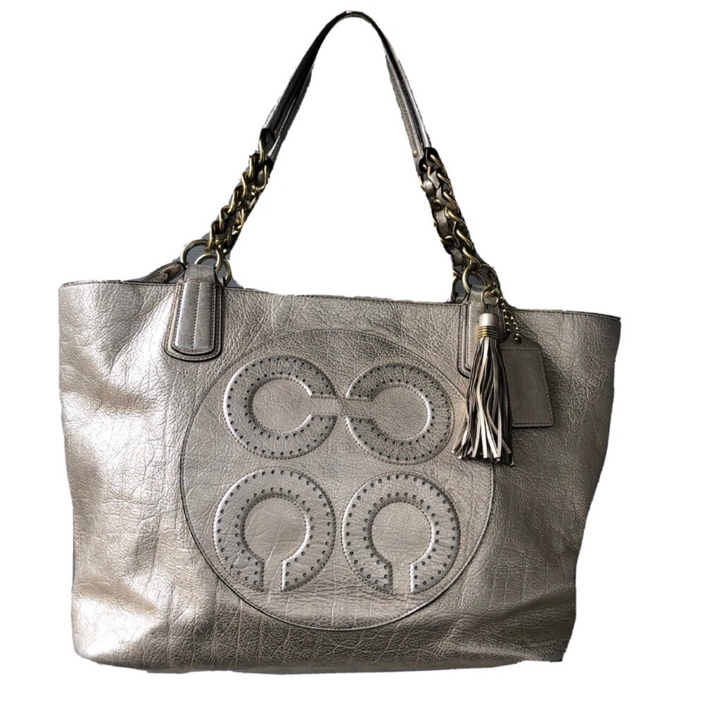 Coach gold leather tote bag with tassel.